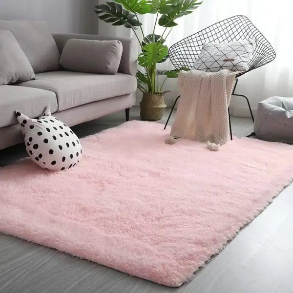 tapis de salon moelleux rose élégant